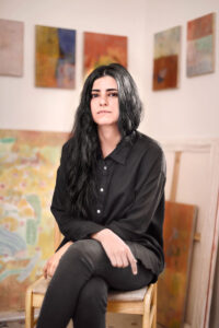 Painter Azadeh Elmizadeh in her studio. Photo credit: Greg McCarthy.
